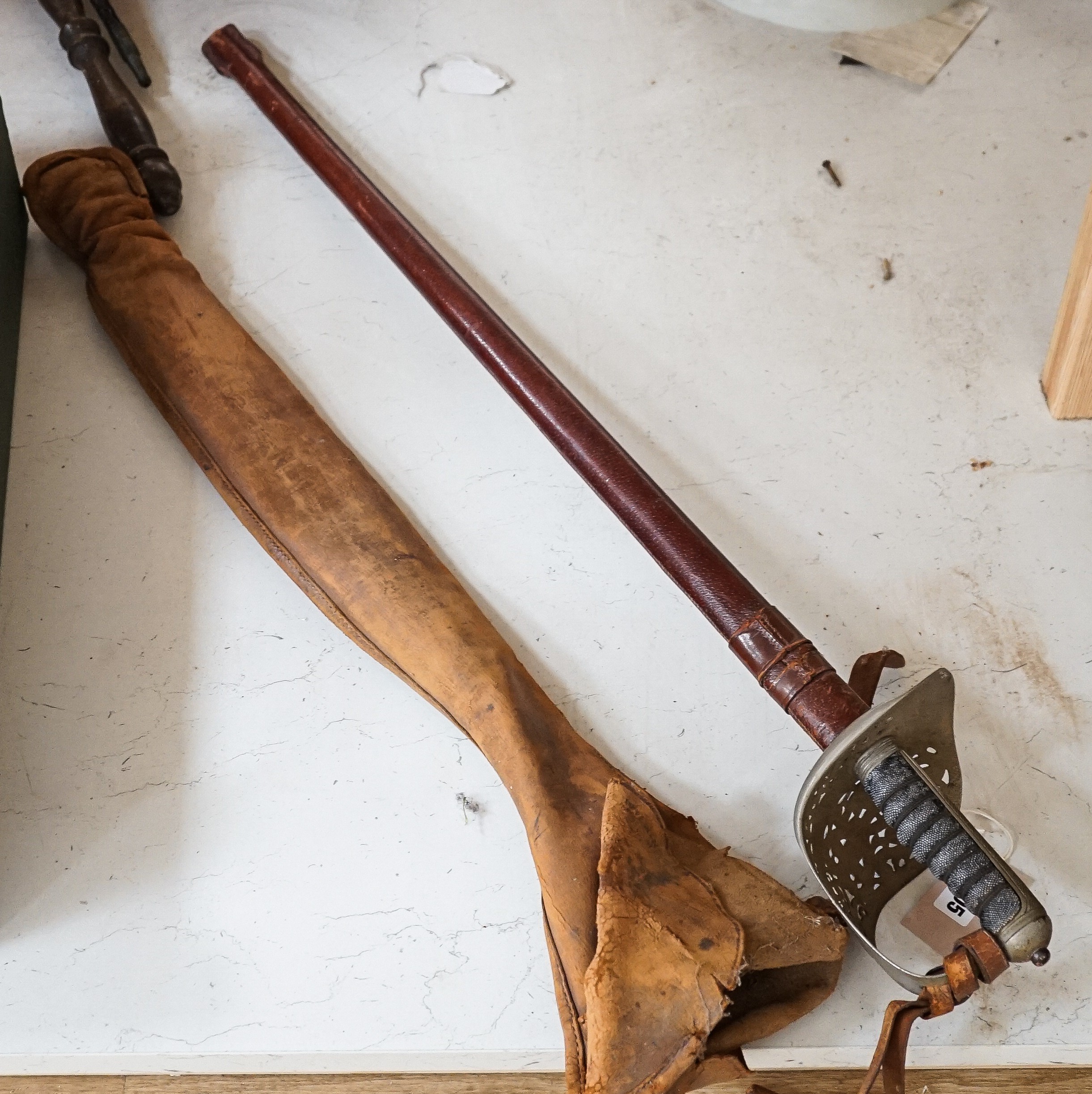 A George V Henry Wilkinson Royal Engineers dress sword with scabbard and cover, the blade etched GHL